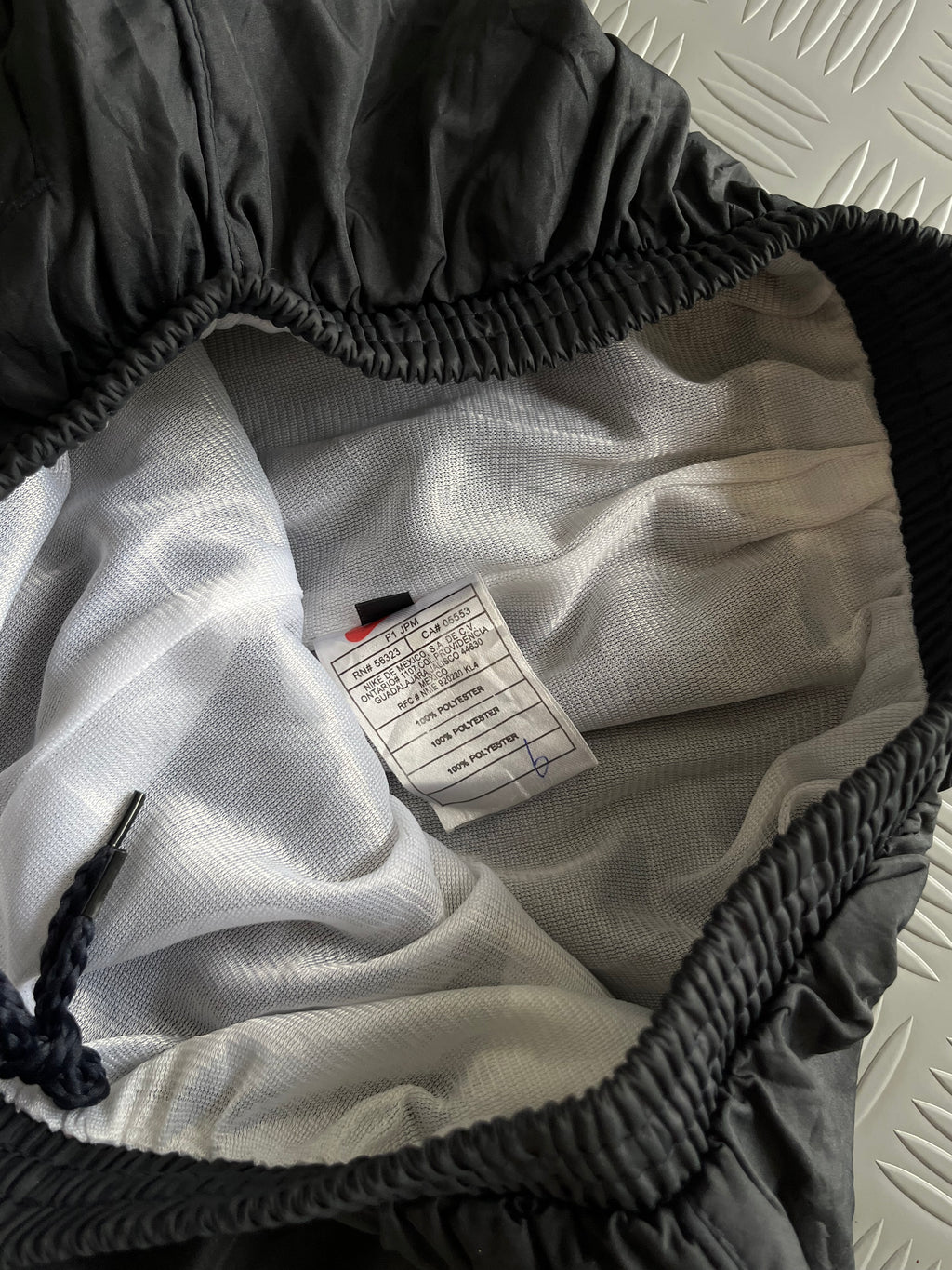 VINTAGE NIKE SPELL OUT BAGGY TROUSER